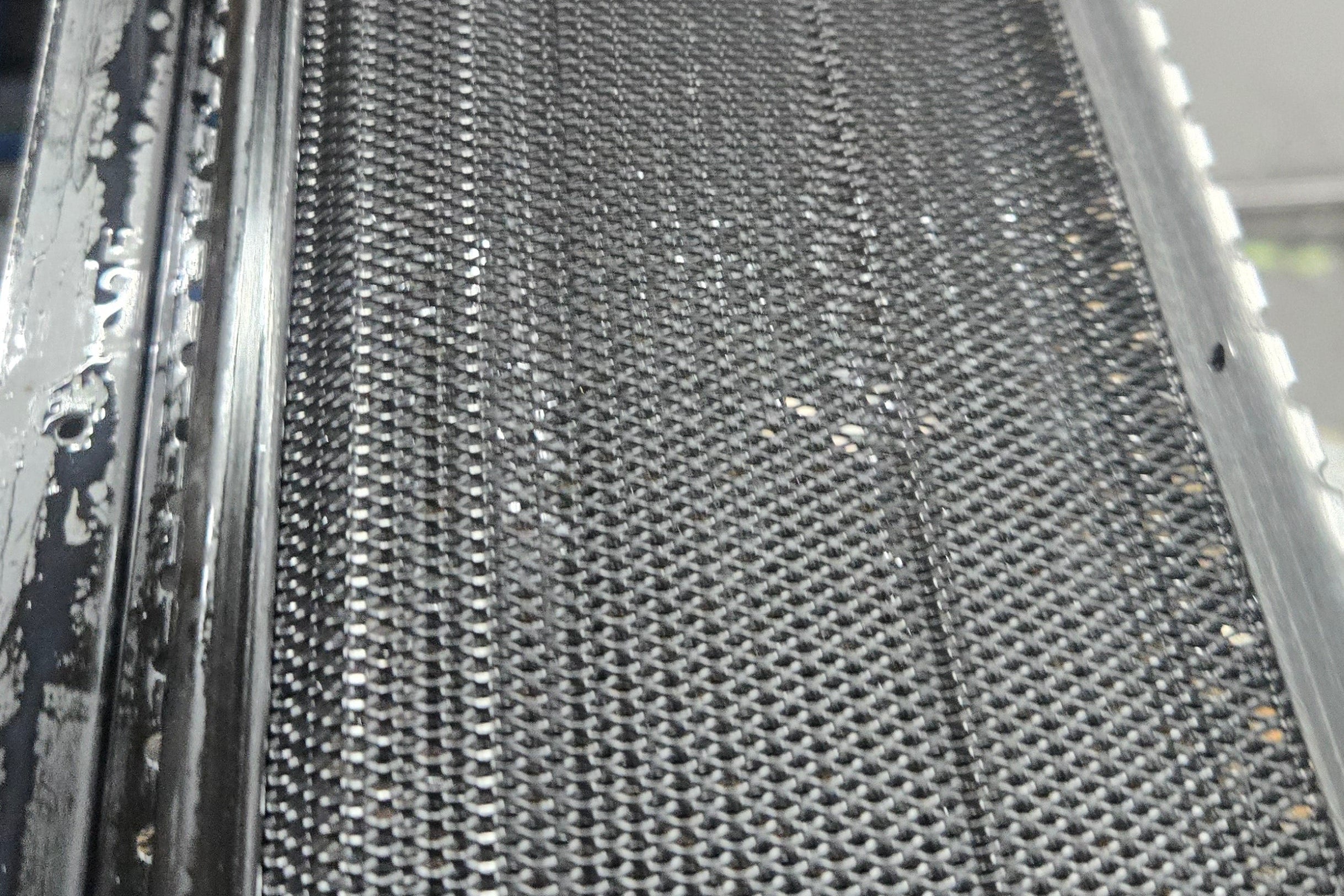 Aluminum micro-mesh gutter guard manufacturing process showing fine mesh filtration